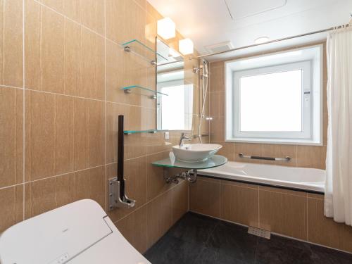 Koupelna v ubytování APA Hotel Namba Shinsaibashi Higashi