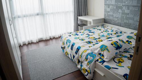 Voodi või voodid majutusasutuse Fairview House apartment karawaci toas