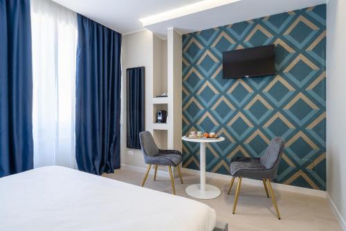 Postel nebo postele na pokoji v ubytování Il Pumo - Apulian Rooms Bari Calefati