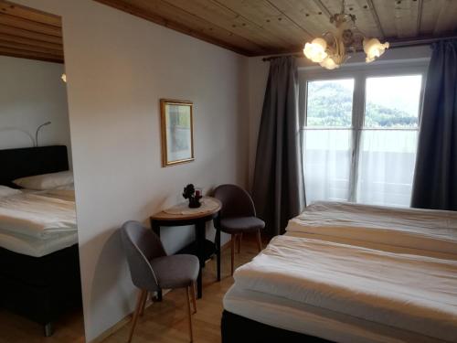 En eller flere senge i et værelse på Appartements Ferienwohnungen Alpenblick
