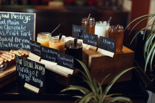 a display of drinks and food on a table at Hyatt Regency Bishkek in Bishkek