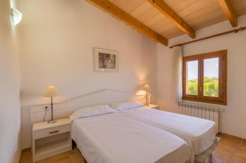 Postel nebo postele na pokoji v ubytování Can Picafort - 29003 Mallorca