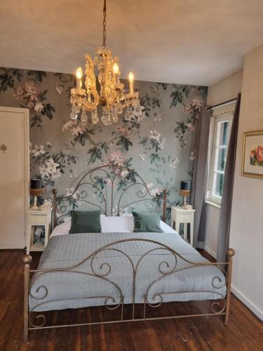 Cama ou camas em um quarto em De Kleine Vesting Arcen