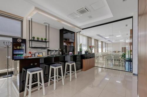Η κουζίνα ή μικρή κουζίνα στο Hotel Marconi