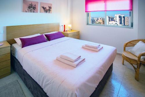 Giường trong phòng chung tại 122 Perfect Apart - Alicante Holiday