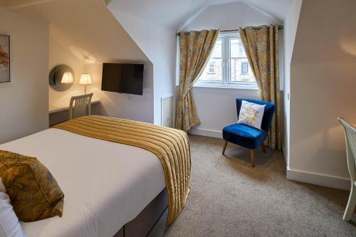 Katil atau katil-katil dalam bilik di The Granville - Delightful 2-bed Victorian Apartment