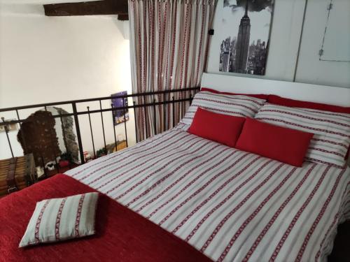Un pat sau paturi într-o cameră la La Casa Doro