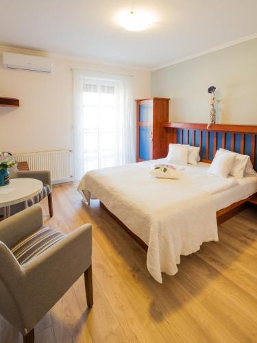 Ein Bett oder Betten in einem Zimmer der Unterkunft Hotel Bonsai
