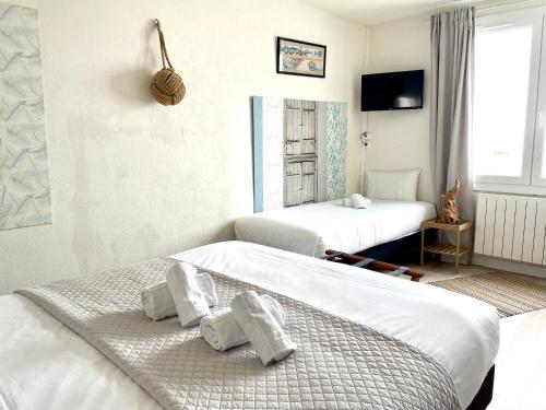 Postel nebo postele na pokoji v ubytování Hôtel Restaurant Gédéon