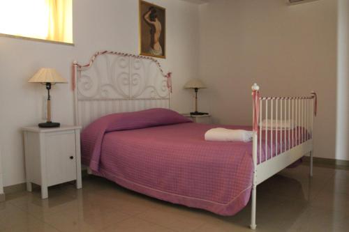 Ένα ή περισσότερα κρεβάτια σε δωμάτιο στο Ideal Residence & SPA
