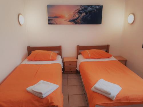 Posteľ alebo postele v izbe v ubytovaní Apartments Barbara Gregovica