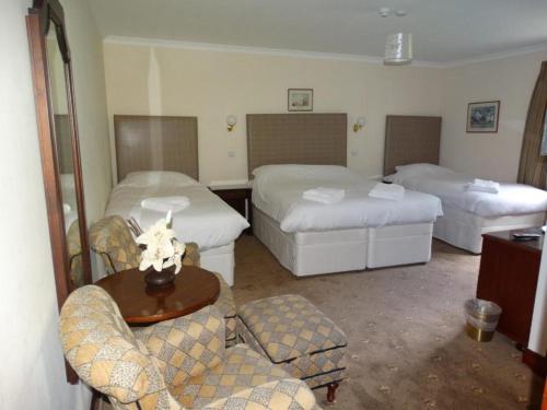 Krevet ili kreveti u jedinici u okviru objekta Laggan Hotel