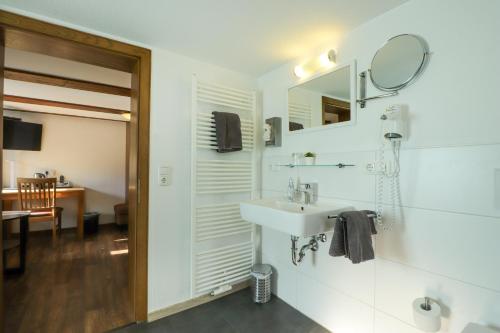 Koupelna v ubytování Hotel Am Dalwigker Tor