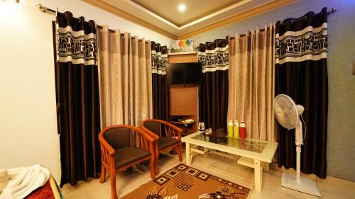 Fotografie z fotogalerie ubytování Srinikethana Home Stay with Swimming Pool v destinaci Madikeri