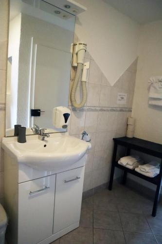 Koupelna v ubytování Gruyère Rooms