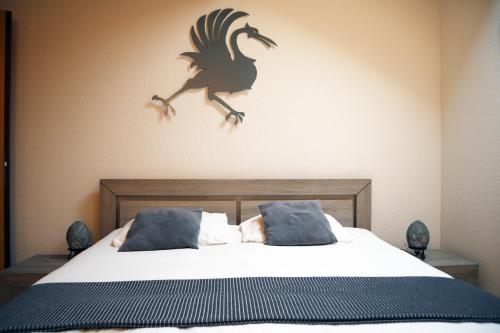 Postel nebo postele na pokoji v ubytování Gruyère Rooms