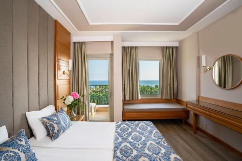 En eller flere senge i et værelse på Royal Atlantis Beach