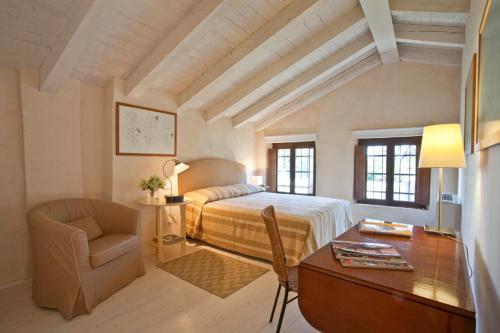 Postel nebo postele na pokoji v ubytování Resort Brandolini Rota