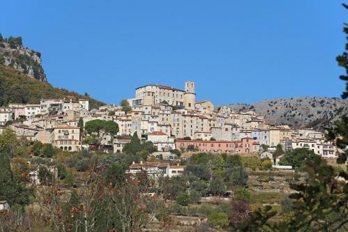 a town on top of a hill at Loup Castel Boutique Hotel B&B in Le Bar-sur-Loup
