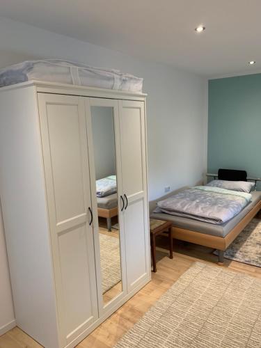 A bed or beds in a room at Ferienhaus Relax - Modernes Haus auf großem Grundstück im Grünen