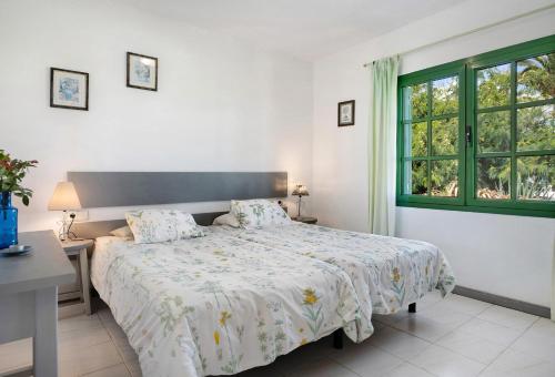 En eller flere senge i et værelse på Jardin del Sol 2