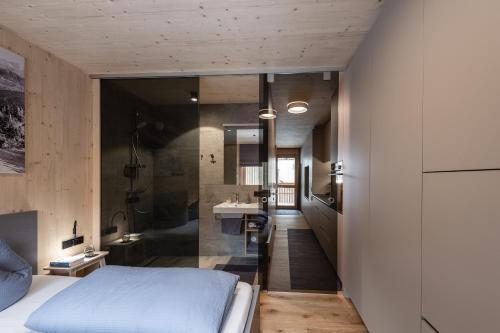 Ein Bett oder Betten in einem Zimmer der Unterkunft Boutique Apartments Mellau
