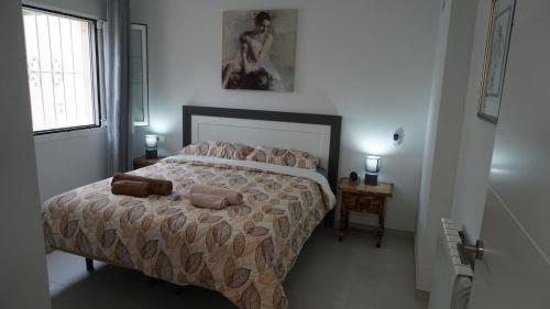 Katil atau katil-katil dalam bilik di VillaDoni: comfortable, hospitable, relaxing place