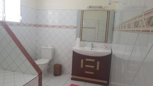 Ванна кімната в T2 en résidence chez l'habitant