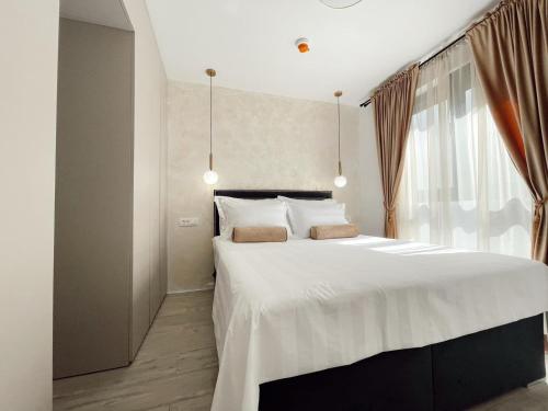 En eller flere senge i et værelse på Apartment in central Dubrovnik with private parking