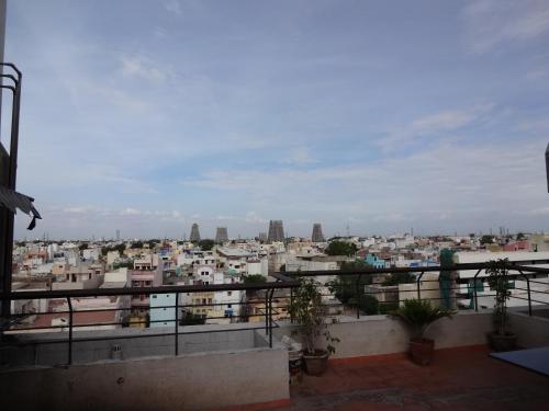 a view of a city from a balcony at The Golden Park in Madurai