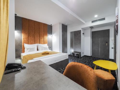 Ένα ή περισσότερα κρεβάτια σε δωμάτιο στο Hotel Anastasia