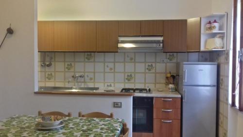 Kuchyň nebo kuchyňský kout v ubytování Casa Armida Chiessi
