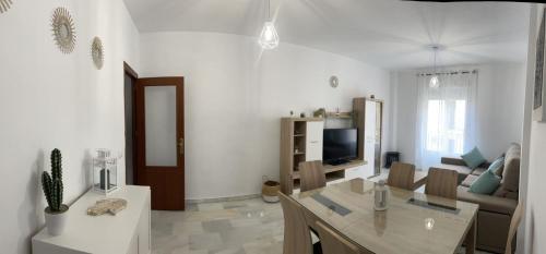 Televisyen dan/atau pusat hiburan di Apartamento Centro Playa