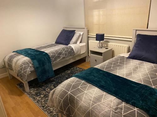 Llit o llits en una habitació de Charming Home on the outskirts of Galway City