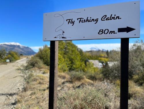 a sign on the side of a road at Fly Fishing Cabin, Great Views in Junín de los Andes
