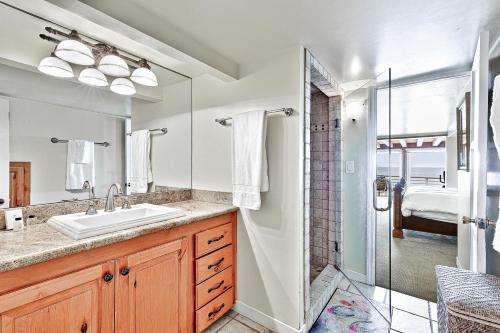 a bathroom with a sink and a shower at Laguna Beach Oceanfront in Laguna Beach