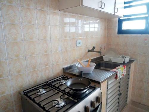 Η κουζίνα ή μικρή κουζίνα στο Solar Vila Mirim
