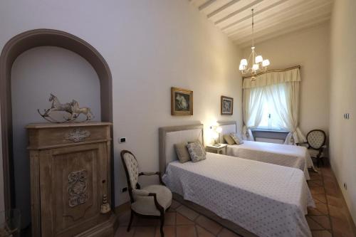 Postel nebo postele na pokoji v ubytování Casa Raiola Ercolano Luxury Rooms & Spa