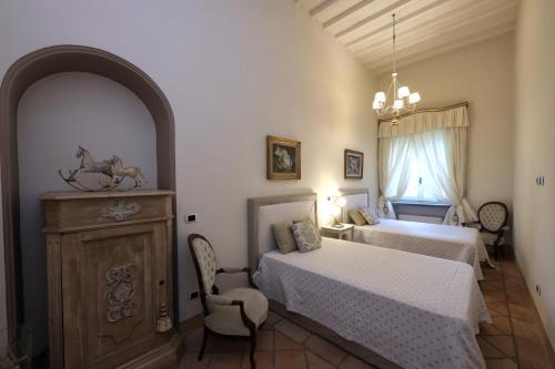 Katil atau katil-katil dalam bilik di Casa Raiola Ercolano Luxury Rooms & Spa