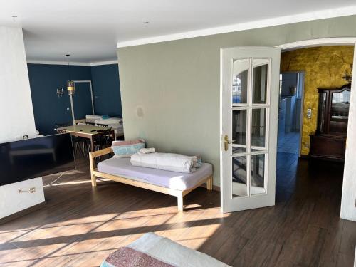 Postel nebo postele na pokoji v ubytování Penthouse