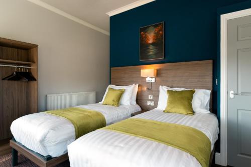 Postel nebo postele na pokoji v ubytování St Andrews Hotel