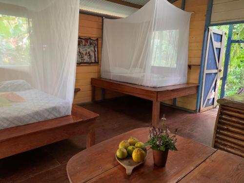 Postel nebo postele na pokoji v ubytování ENSUEÑOS miskita house