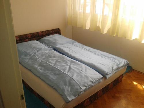Postel nebo postele na pokoji v ubytování Apartment Marija