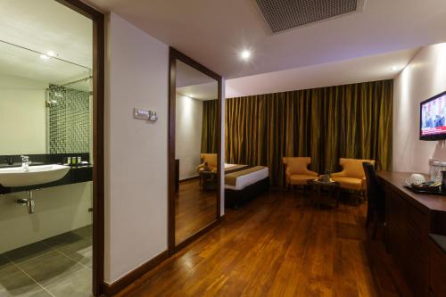 Koupelna v ubytování Renuka City Hotel