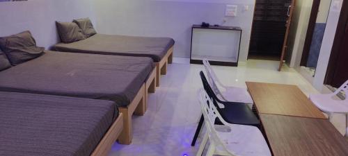Postel nebo postele na pokoji v ubytování C M HOTEL NEW