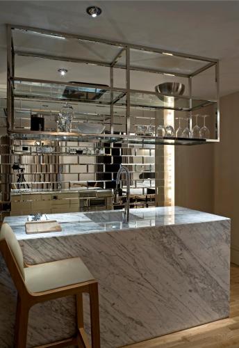 a kitchen with a large marble counter with a sink at Witt Istanbul Suites in Istanbul