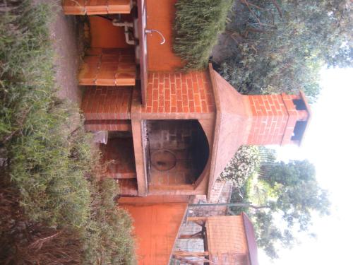 an overhead view of an orange building with trees at Apartman Lavanda in Kali
