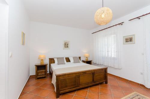 Postel nebo postele na pokoji v ubytování Antares Apartments