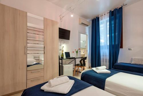 Postel nebo postele na pokoji v ubytování Terre Bianche