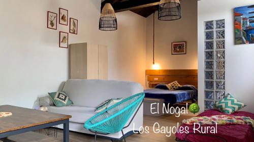 Ένα ή περισσότερα κρεβάτια σε δωμάτιο στο Estudio Pajar rural con bonito jardín - Los Gayoles Rural